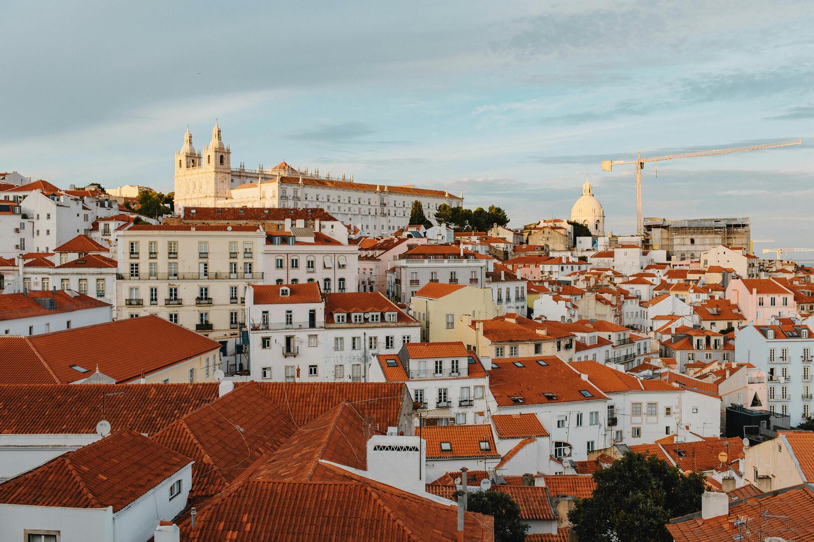 spring light over Alfama rooftops and the Tagus River