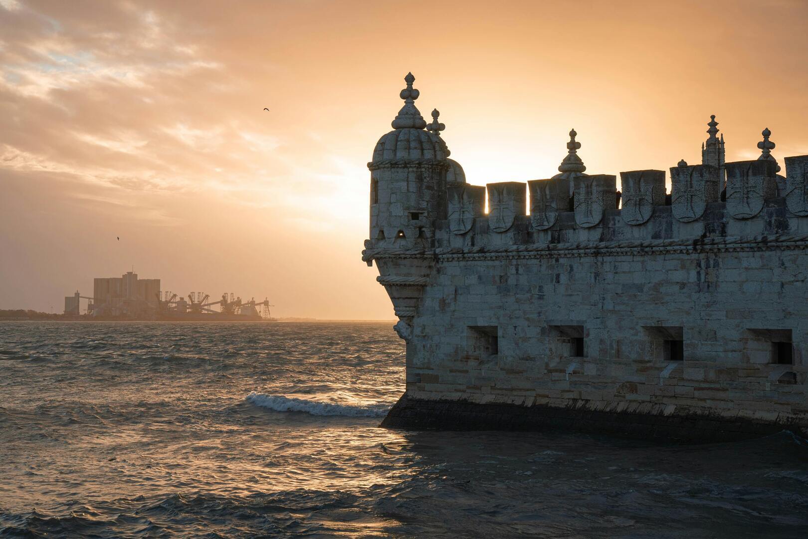 Belém Tower at sunrise over Lisbon
