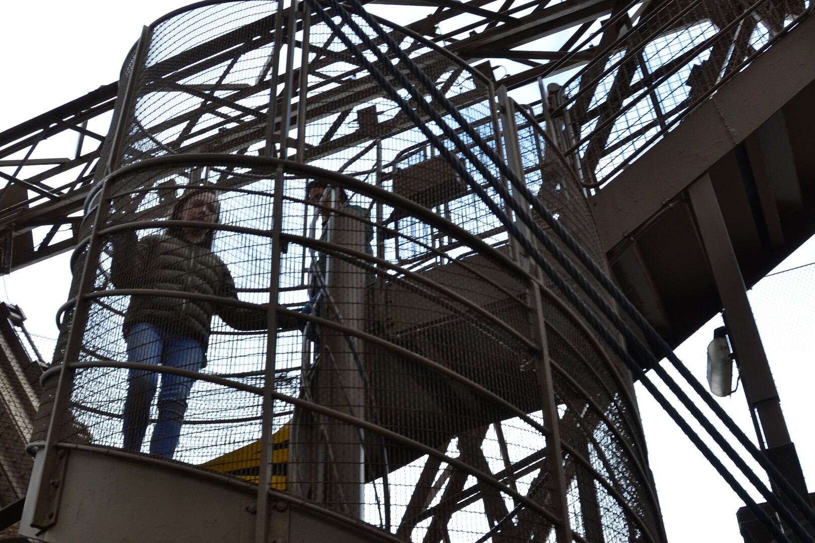 Spring light across the Eiffel Tower staircase structure