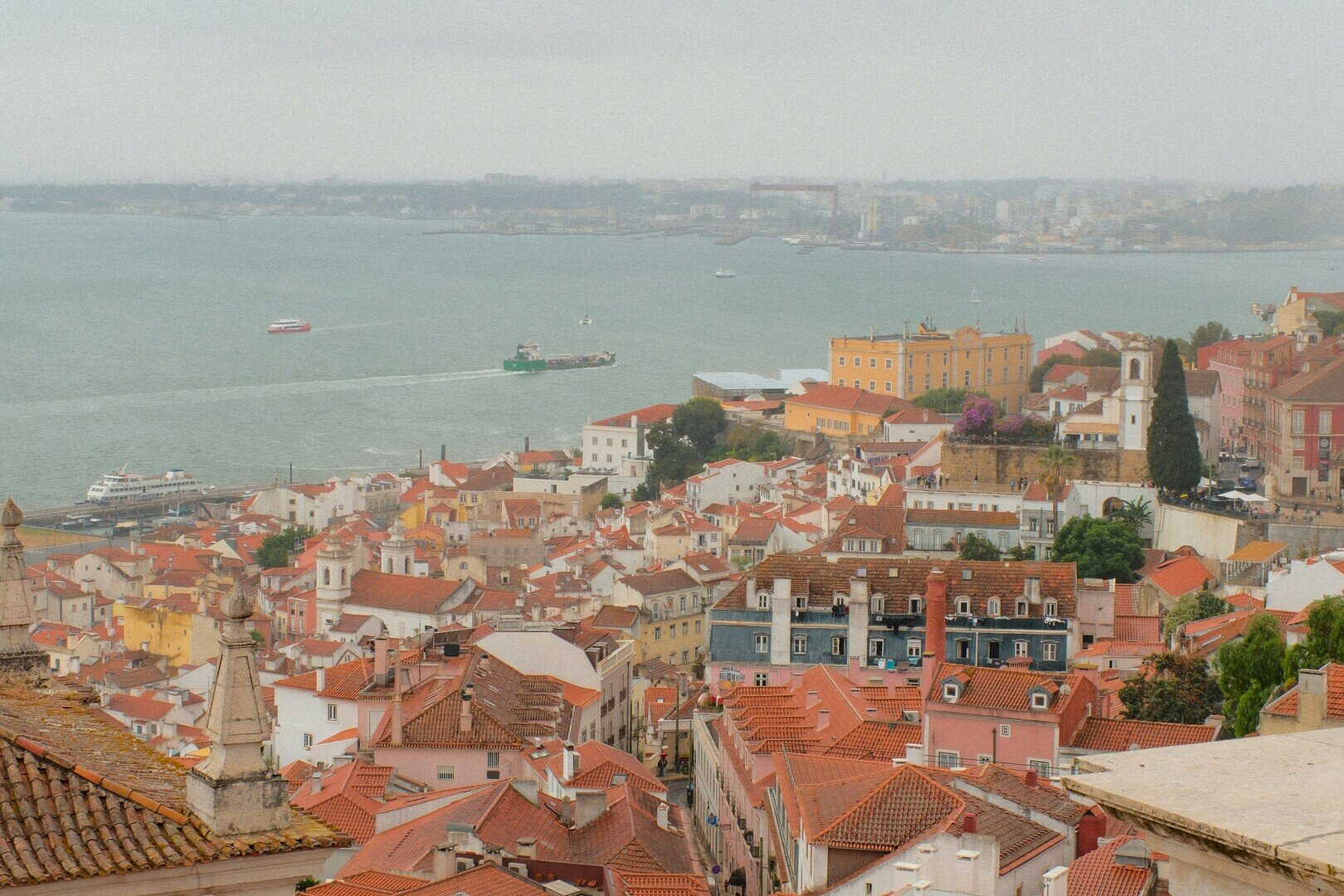 Spring light over Lisbon rooftops and the Tagus River