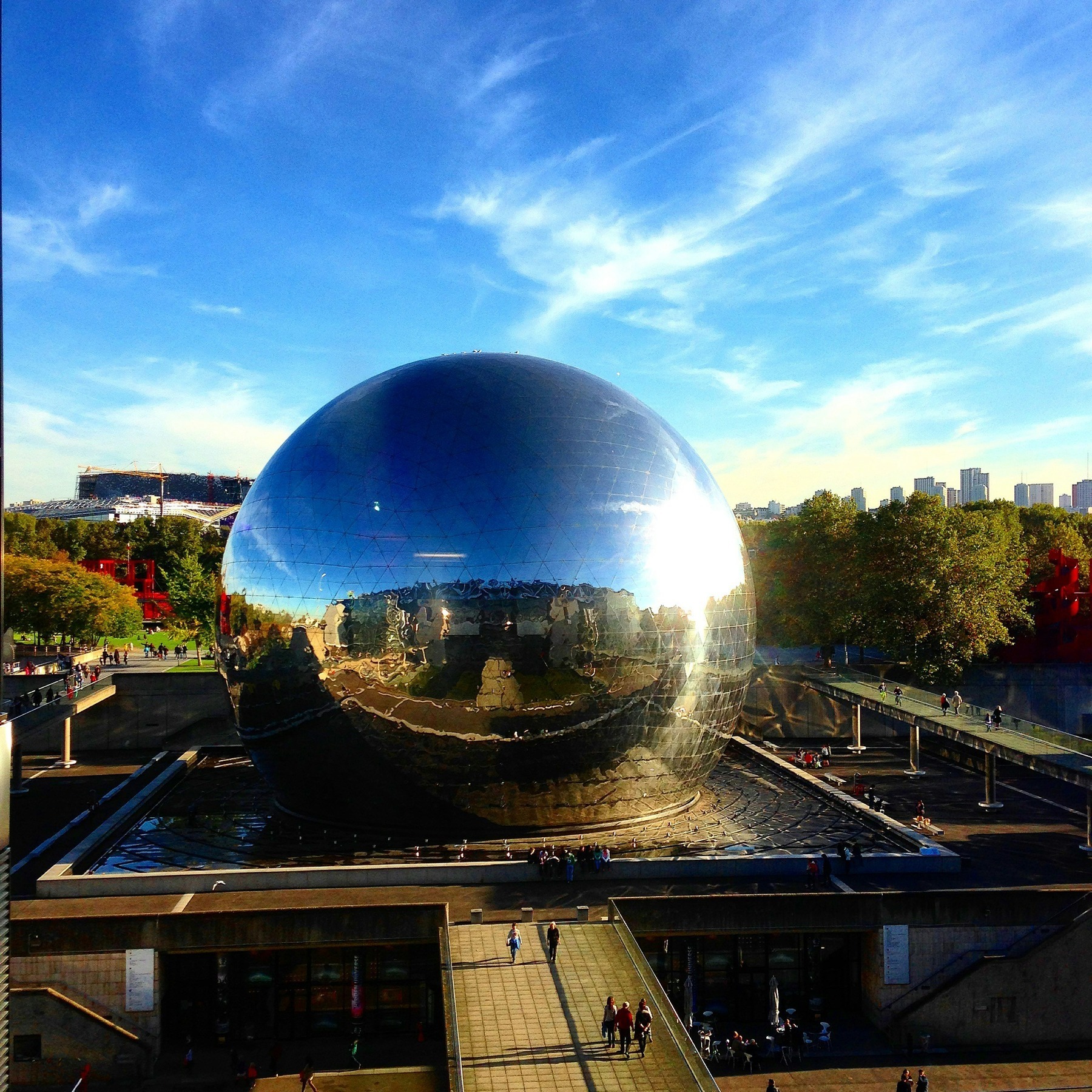 The mirrored Géode sphere reflecting the sky at Parc de la Villette in Paris